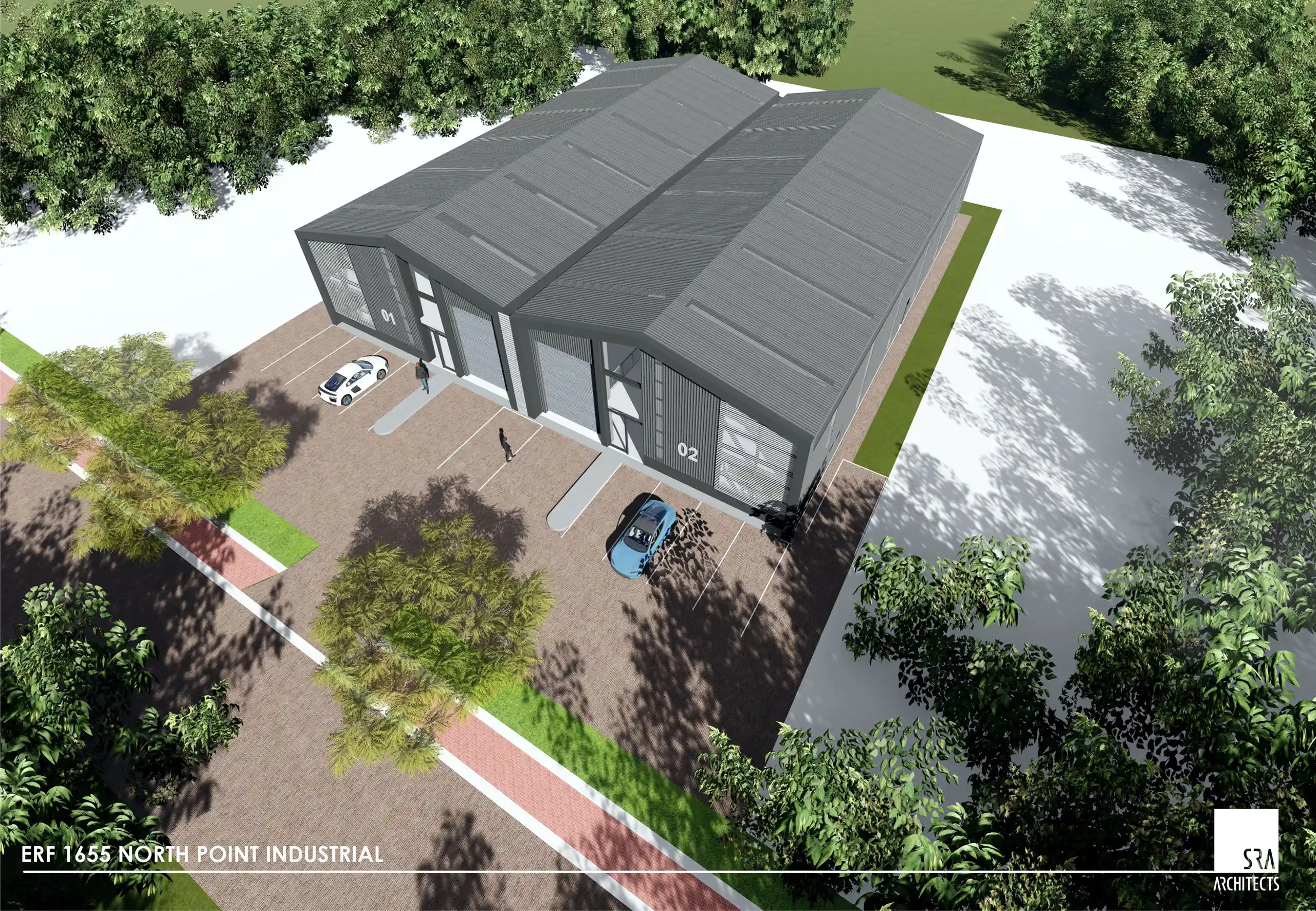 Aerial view of a modern industrial building with grey roof, ample parking, and surrounding green landscaping, showing the entrance and trees